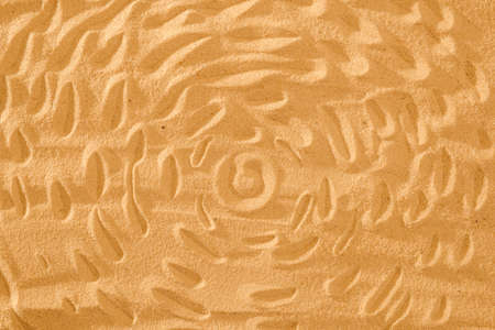 Sun on sand on beach holiday background sign conceptの写真素材