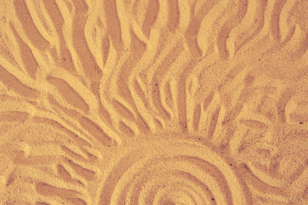 Sun and ocean on sand on beach holiday background sign concept