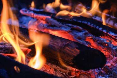 Burning coals at night ,Decaying charcoal, barbeque season