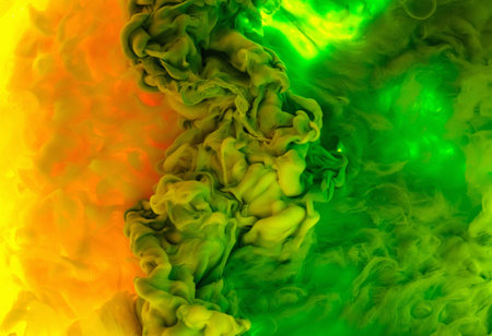 Color drop in water, photographed in motion. Ink swirling. Cloud of silky ink under water isolated...