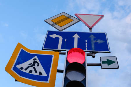directional road signs close up over blue skyの写真素材