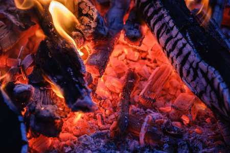 Burning coals at night ,Decaying charcoal, barbeque seasonの写真素材
