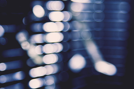 abstract blue blur of city lighting digital lens flare glare, blinds light shadow background
