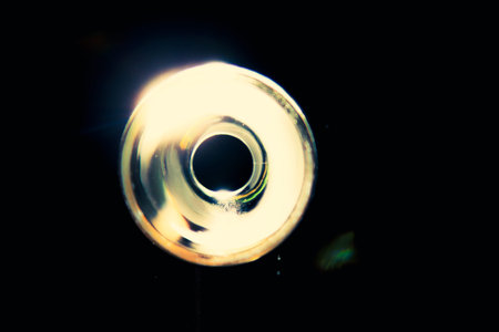 Ray of lamp spot light over black background, square stage illumination abstractの写真素材