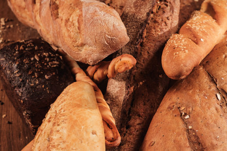 Group of Fresh fragrant bread on the table. Food concept Wheat pastry