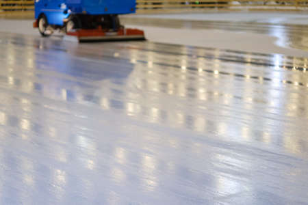 Resurfacer machine levels ice at rink stadium. Winterの写真素材