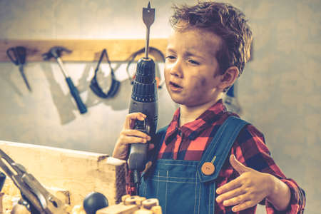 Child and fathers day, concept carpenter tool wood gift,  person home.の写真素材