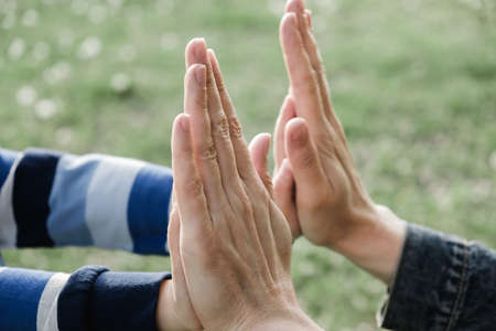 hand child mother son boy parent family. care.の写真素材