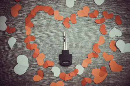 Key to heart symbol of love. Concept dating close up