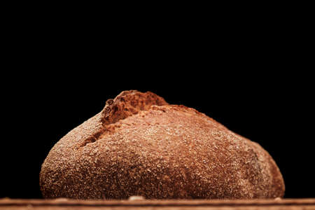 Whole Fresh fragrant bread on the table. Food concept Wheat pastryの写真素材