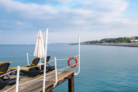 Summer ocean landscape with pier, sunny blue sky. tourism natureの写真素材