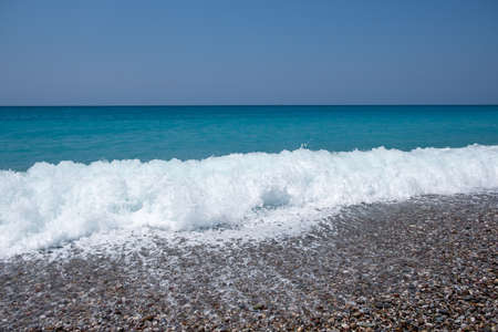 Ocean wave with spray, sea summer blue surf. environment tropicalの写真素材