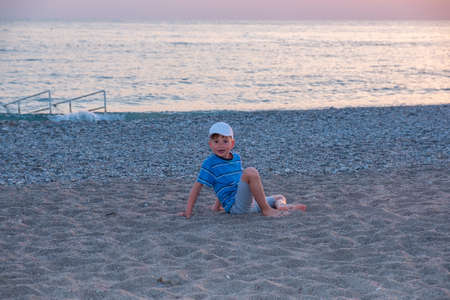 Child play sand summer ocean vacation sea. childhood castleの写真素材