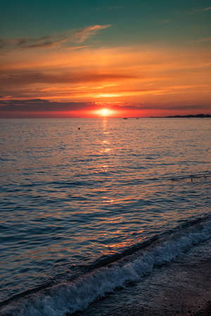 Dusk sea water wave dawn ocean sunrise. twilight surfの写真素材
