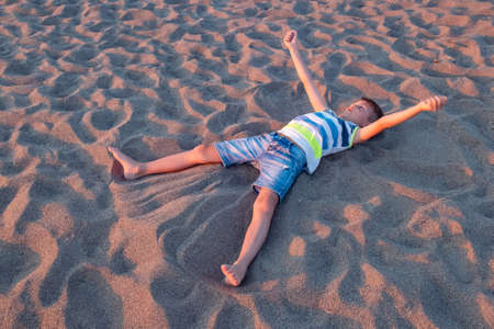 Child play sand summer ocean vacation sea. fun castleの写真素材