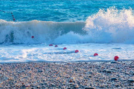 Ocean wave with spray, sea summer blue surf. beach sky