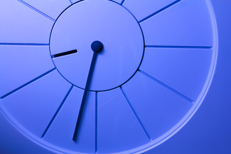 Closeup photo of a simple blue clock.の写真素材