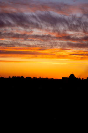 Sunset in the city, view from a high floorの写真素材