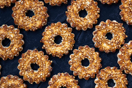 Food pattern of cookies on black background. High quality photo
