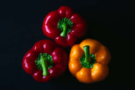 Three big sweet bell peppers close up top view. High quality photoの写真素材