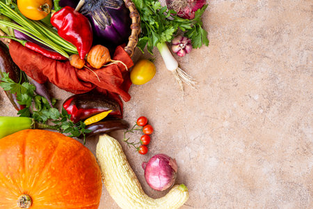 Fresh ripe vegetables top view, autumn harvest of vegetables, eggplant, onion, garlic, tomato,...