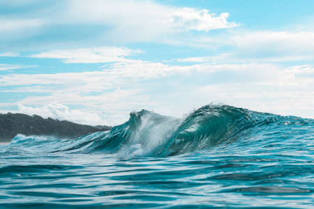 Wave breaking at Bawley Point Beach.の写真素材