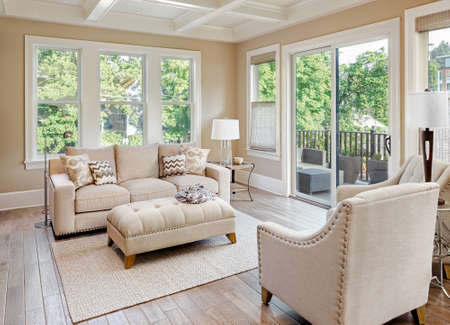 Beautiful living room with hardwood floors in new luxury homeの写真素材