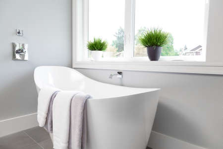 Bathtub in master bathroom in new luxury homeの写真素材