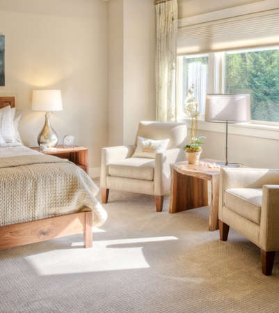 Beautiful Bedroom Detail on Sunny Day in New Luxury Homeの写真素材