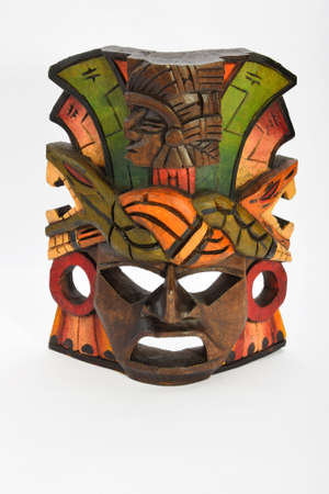 Indian Mayan Aztec wooden mask with anaconda and jaguar isolated on white backgroundの写真素材