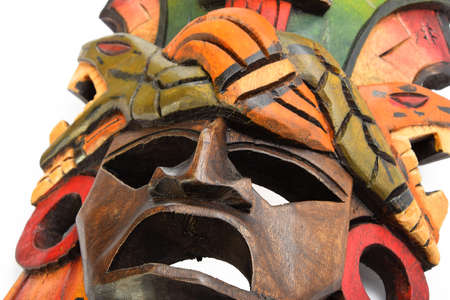 Indian Mayan Aztec wooden mask with anaconda and jaguar isolated on white backgroundの写真素材