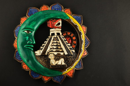 Mexican Mayan Chichen Itza souvenir ceramic painted plate with Moon, pyramid and girl isolated on...