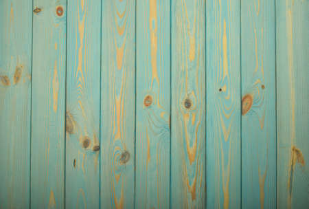 Light blue vintage rustic aged painted wooden panel with vertical planksの写真素材