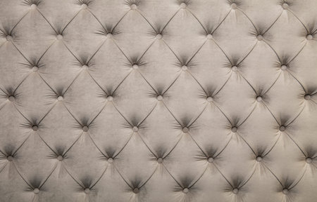 White beige velvet capitone textile background, retro Chesterfield style checkered soft tufted...
