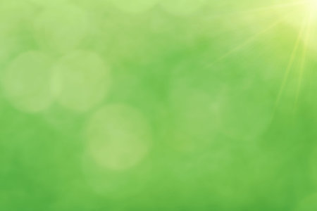 Summer glitter fresh green bright light and greenery bokeh circles abstract blur effect background...