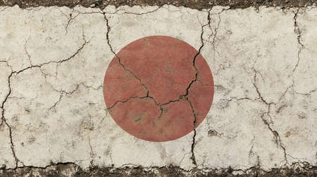 Old grunge vintage dirty faded shabby distressed Japan, Nippon or Nihon koku flag background on broken concrete wall with cracksの写真素材