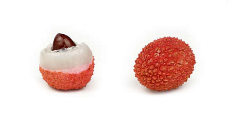 Fresh red lychee isolated close up on whiteの写真素材