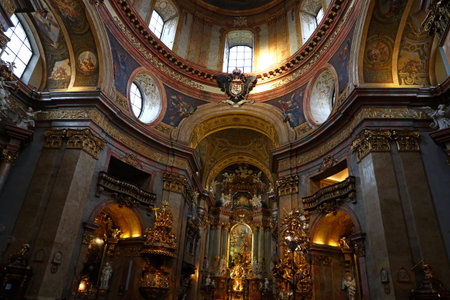 Low angle view of beautiful altar and cupola with fresco of historic baroque church of Saintt Peter in Vienna, Austriaのeditorial素材