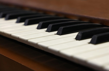 Close up old vintage piano keyboard, low angle view
