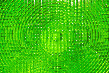 Abstract background of vivid green faceted plastic reflective surface sign