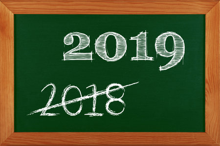 Green school chalkboard blackboard sign in brown wooden frame with 2019 and 2018 strikethrough chalk...