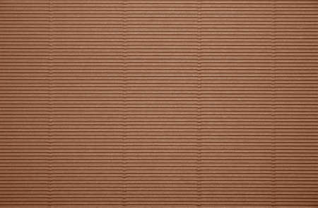 Close up background pattern texture of brown corrugated packaging cardboardの写真素材