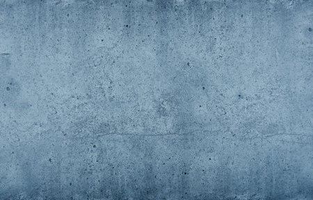 Grunge blue uneven stone texture background with cracks and stains