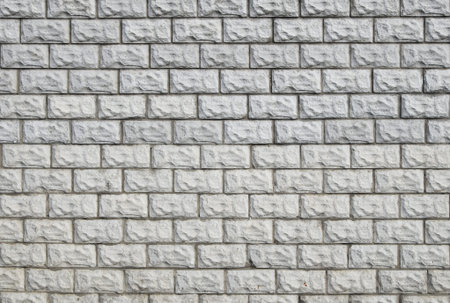 White painted brick tile wall background texture pattern; close up