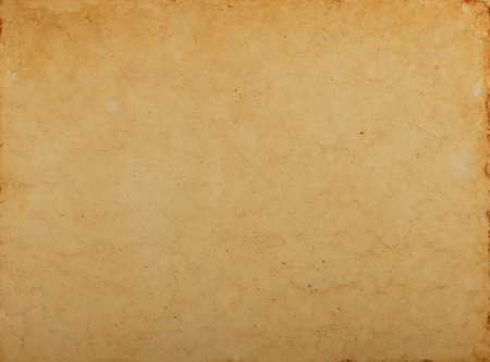 Close up background texture of blank old antique vintage brown paper parchment scroll, aged and weatheredの写真素材