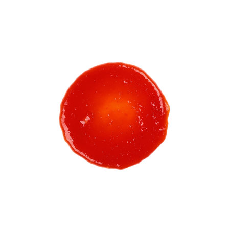 Close up wet stain of red ketchup tomato sauce isolated on white background, top view, directly aboveの写真素材