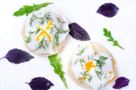 Poached eggs at eggburgers, rustic styleの写真素材