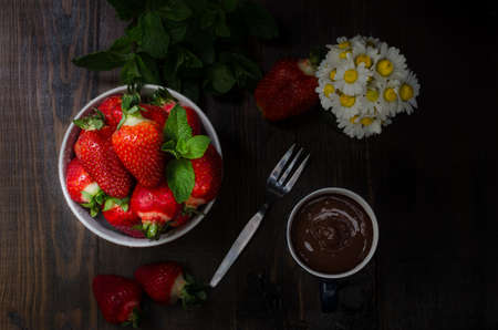 Bowl with strawberry, still life dark photographyの写真素材