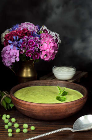 Vegetarian fresh pea cream soup, still lifeの写真素材
