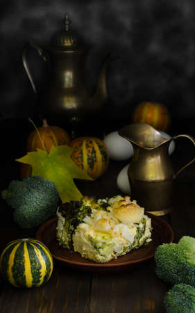 Healthy cabbage casserole at wooden table, still life, rustic styleの写真素材